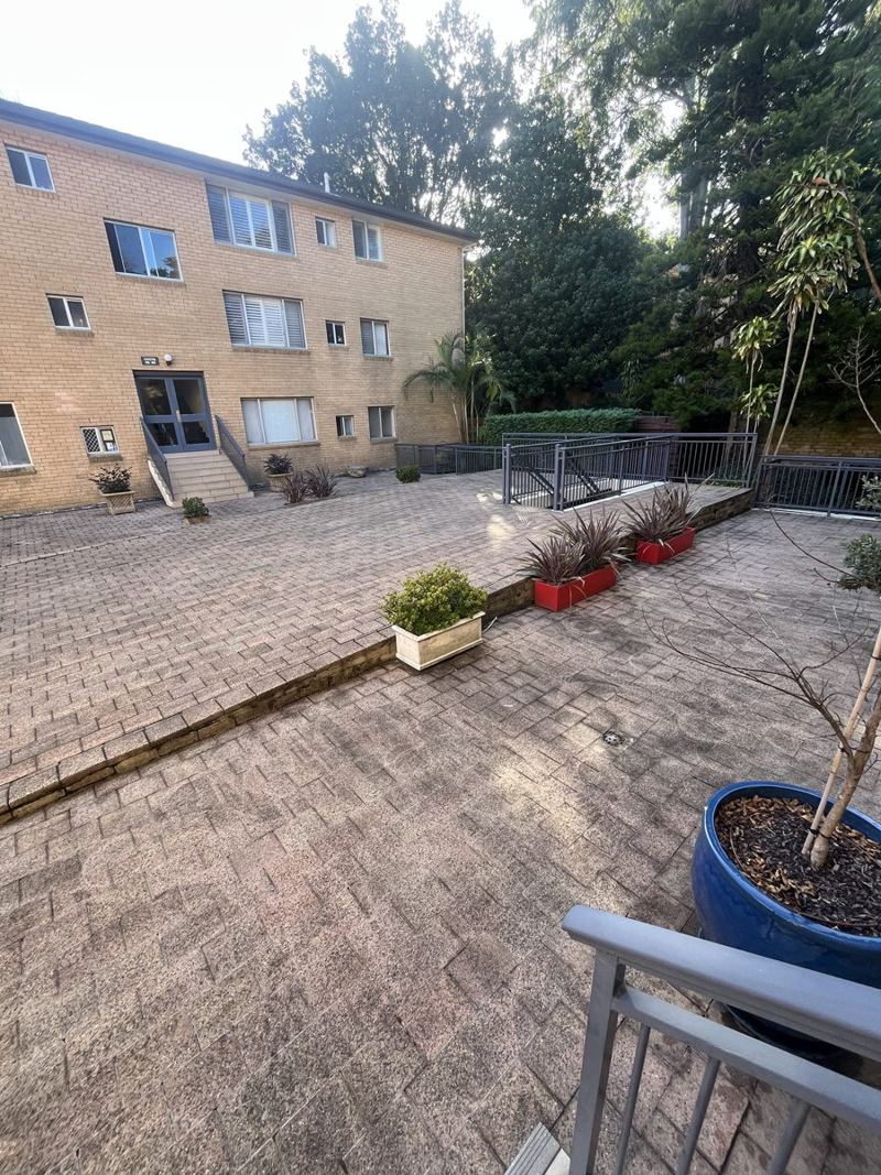 Clean paved courtyard of a strata building